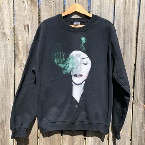 Black crewneck sweatshirt think it says ILLY